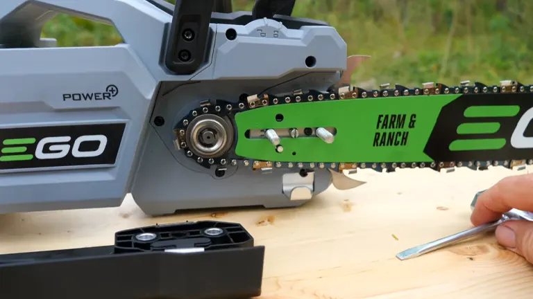 Close-up view of the EGO CS2000 chainsaw's bar and chain, highlighting the "FARM & RANCH