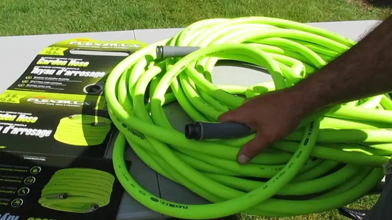 Person handling a coiled Flexzilla garden hose, with the product box in the background.