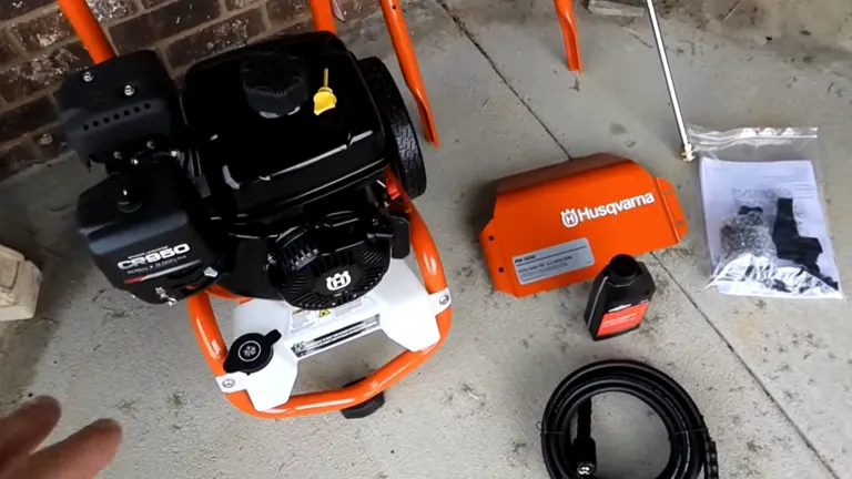 Person unbox the Husqvarna 3200 PSI Gas Pressure Washer