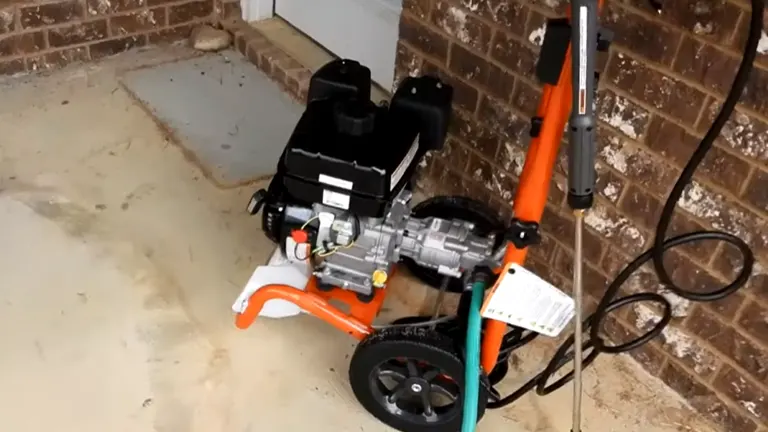 Husqvarna 3200 PSI Gas Pressure Washer sitting beside the wall