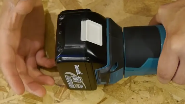 Battery and rear view of the Makita multi-tool showing the control interface and grip.