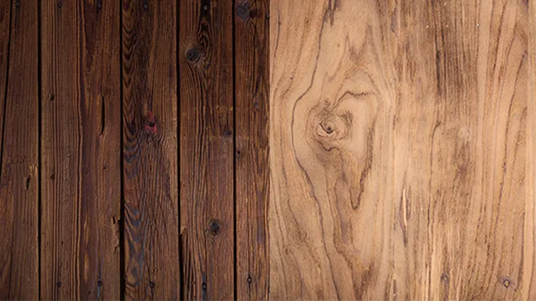 A variety of wood planks with different finishes, ranging from dark to light, displaying the contrast in wood colors and grains.
