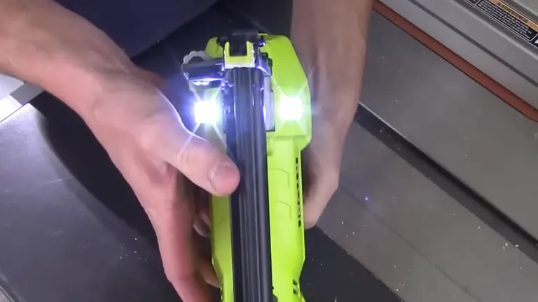 Close-up of the Ryobi P320 showing its dual LED lights illuminating the work area.