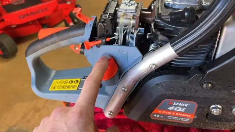 Detail view of a Senix chainsaw's engine and handle, showing adjustment knobs and branding.