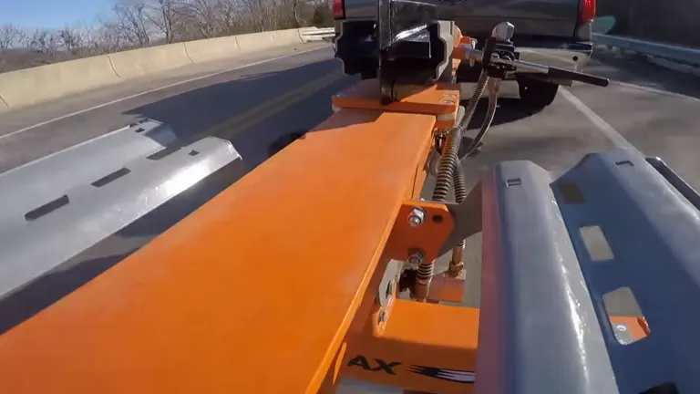 Yardmax 35 Ton Log Splitter attach in the back of the truck
