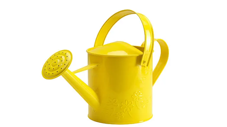 A bright yellow watering can isolated on a white background, designed with a floral pattern.