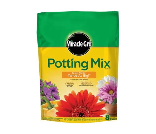 Bag of Miracle-Gro Potting Mix with a bright yellow design, showcasing flowers and a promise of growth.