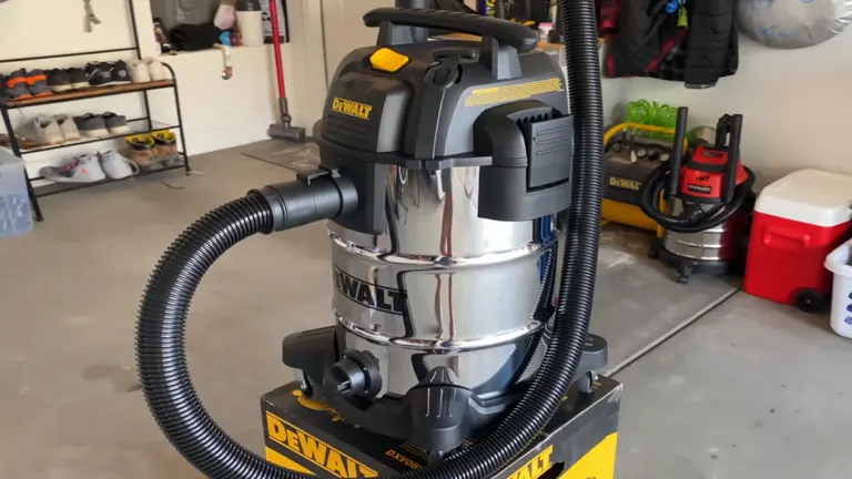 DeWalt 8 Gallon Wet/Dry Vacuum standing in a garage, showcasing its flexible hose and robust design.
