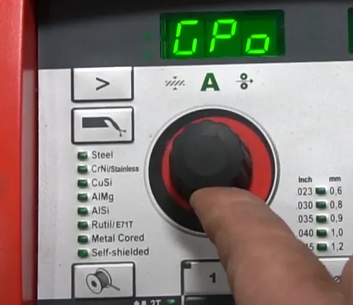 Digital display of the Fronius TransSteel 2200 welder showing current settings during operation.