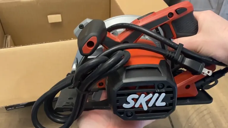 SKIL 5280-01 Circular Saw being unpacked from box, held in hand.