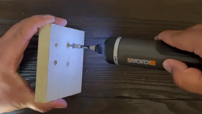 Demonstration of a WORX electric screwdriver driving a screw into a block of wood.