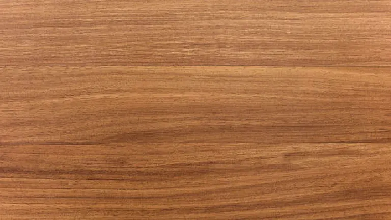 Close-up of light brown wood grain with subtle linear patterns.