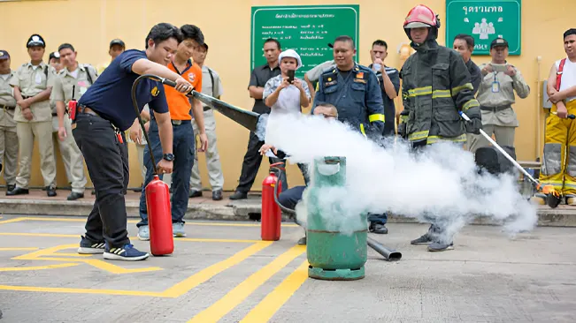 A community fire safety demonstration, highlighting education and involvement in fire prevention.