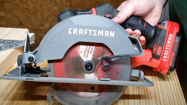 Craftsman 20V (CMCS551B) Cordless Circular Saw held on a wooden surface.