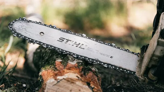 Close-up of a Stihl chainsaw bar and chain