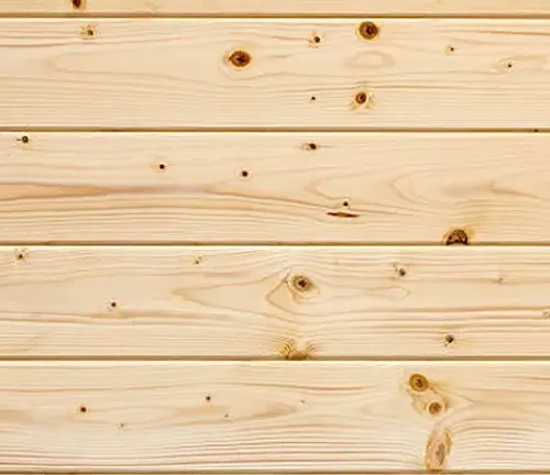 Wooden boards showing natural knots, circular patterns from where branches once grew.