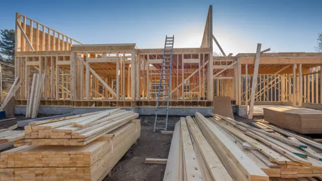 Timber framing in eco-friendly construction, highlighting renewable wood resources for sustainable building.