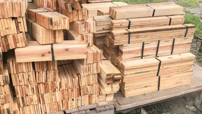 Stacks of processed value-added timber products ready for distribution and sale.