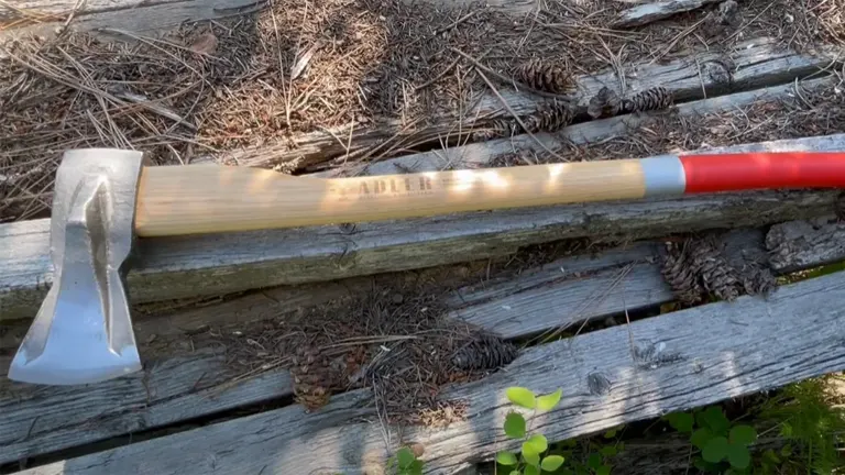 Adler splitting axe resting on wooden planks outdoors