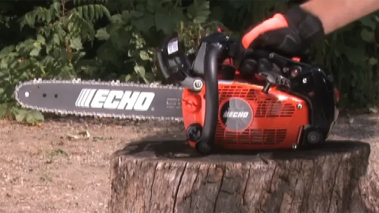 Echo CS-355T chainsaw placed on a tree stump, highlighting its lightweight design and professional usability.